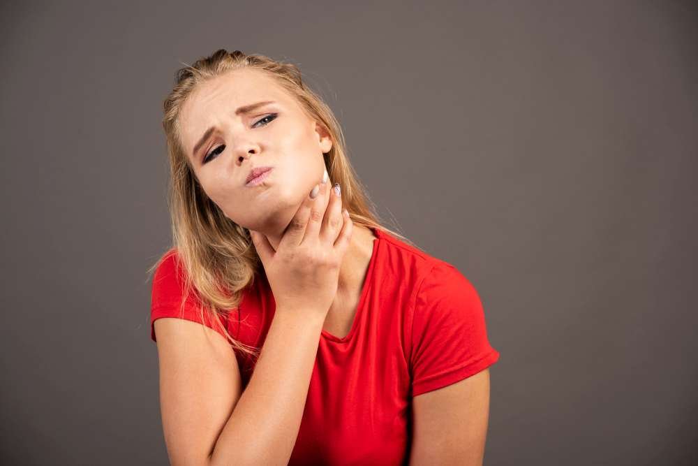 Feels Like Something Is Stuck in My Throat: Causes & Remedies